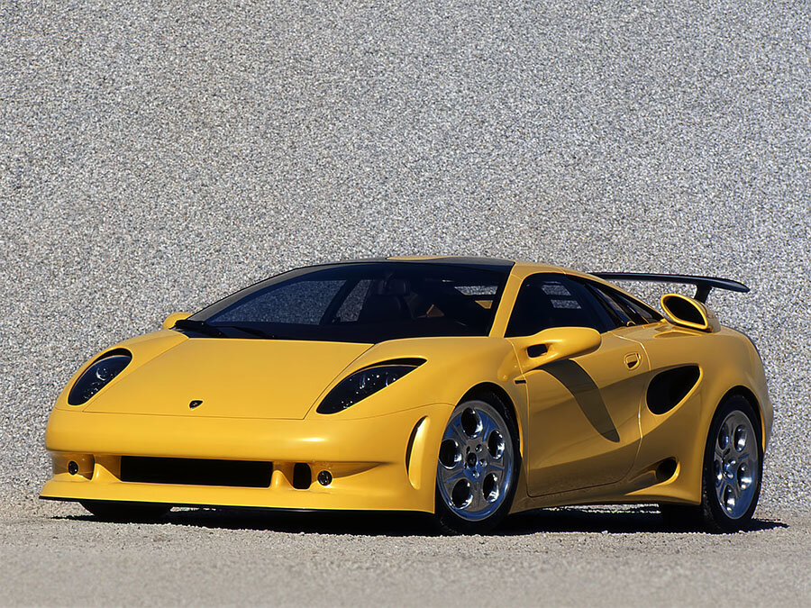 Yellow Lamborghini Cala sitting on gravel