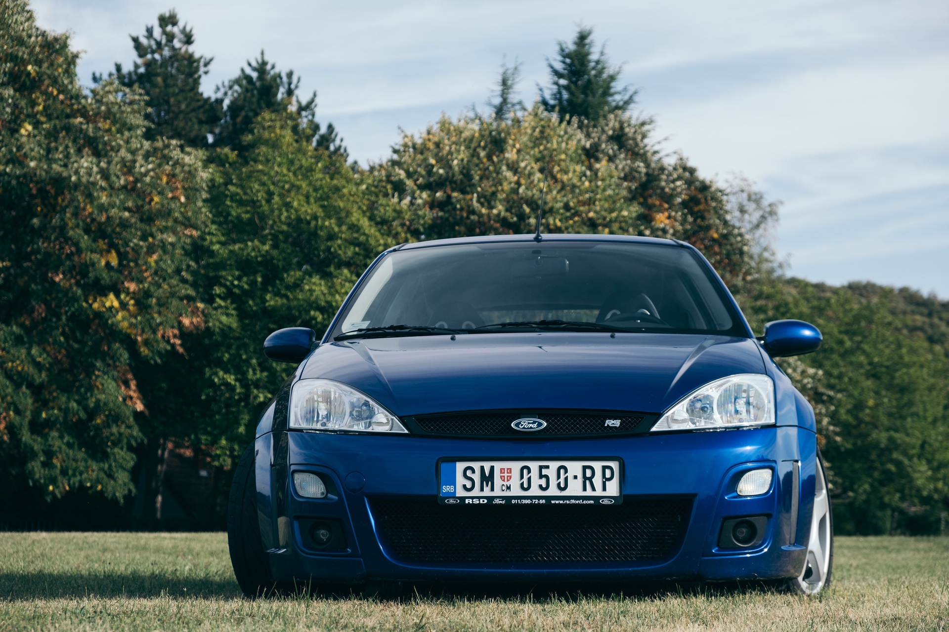 Front view of blue Ford Focus RS in field