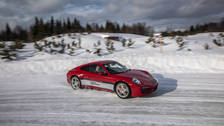 Porsches on ice Throwing 911s and Caymans sideways in the snow at Camp4 Canada