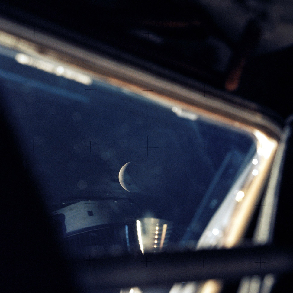 The crew's view of the moon from the Lunar Module. Worth noting is that they switched to the two Lunar Module Hasselblads that were supposed to be used and discarded on the moon.