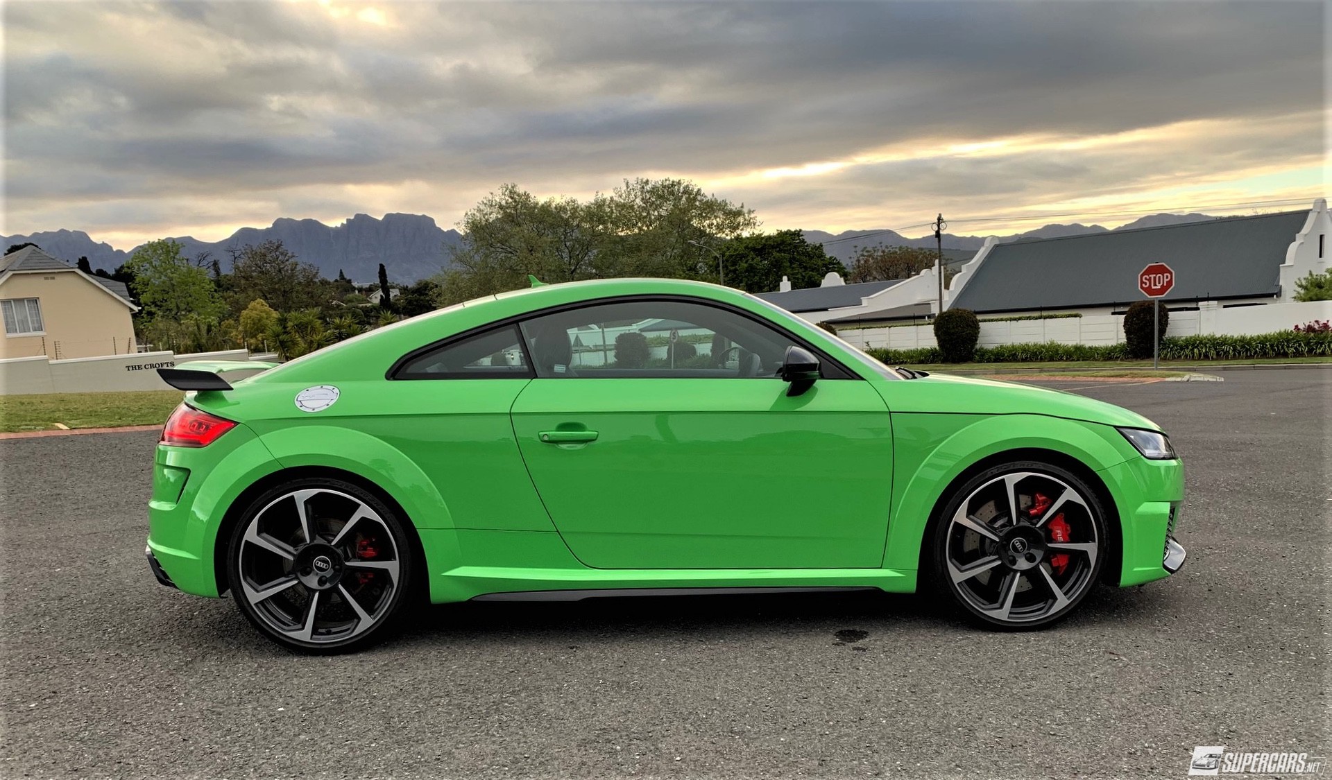 Side view of green 2022 Audi TT RS