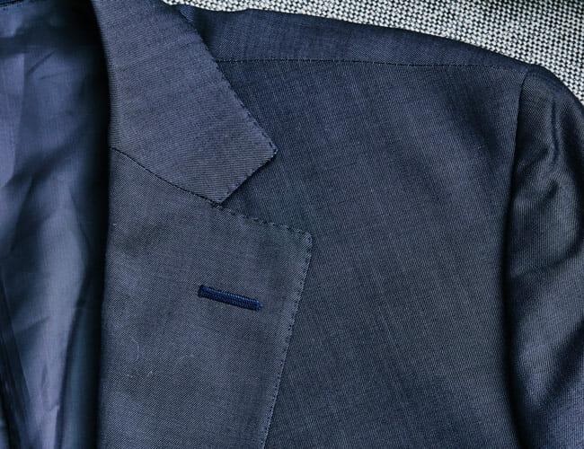 Why Do Suits Have a Random Buttonhole on the Lapel? We Found Out