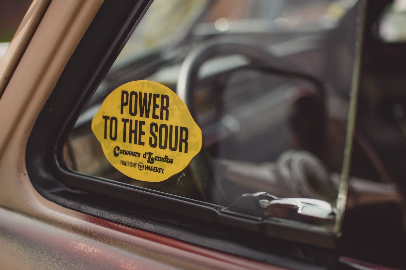 Power to the sour decal on side window of a car
